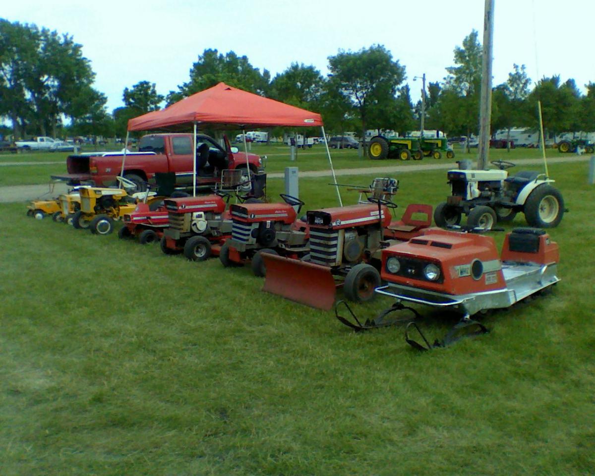 My Massey mowers at a show and my snowmobile