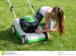 girl-mower-grass-20310625.jpg