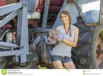 farmers-daughter-model-posing-as-rural-environment-52417054.jpg