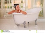 beautiful-young-sexy-girl-dark-hair-bathtub-114166482.jpg