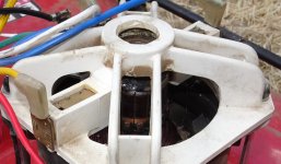 mower motor with closer view of other melted tab.jpg