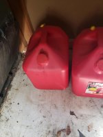 red cap on gas can.jpg red cap on gas can.jpg