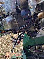 some of the wires hanging out by the carburetor and throttle bracket.jpg some of the wires hanging out by the carburetor and throttle bracket.jpg