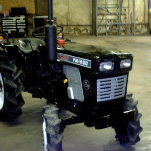 Years ago I took 3 junked tractors and reassembled them into 1 that ran perfect, then I gave it a paint job w/new decals.