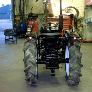 Years ago I took 3 junked tractors and reassembled them into 1 that ran perfect, then I gave it a paint job w/new decals.