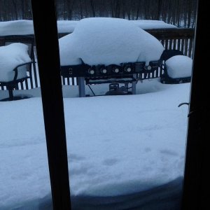 Back deck after the rain melted some of the snow.