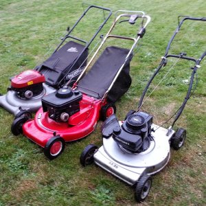 My "Fleet" 2013 - L to R - 2008 Craftsman 3'n'1 with a (probably 3.75HP) Briggs & Stratton Vanguard, 1987 MTD 127-362-013 22" 4HP Self-Propelled bagge