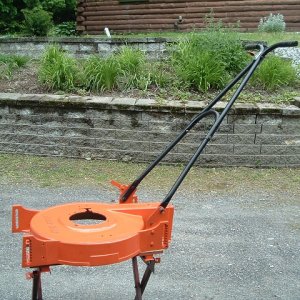 Bobcat cleans up good - while the motor is off to the motor doctor, I've been fooling with the rest of the machine. The deck is cast aluminum / magnes