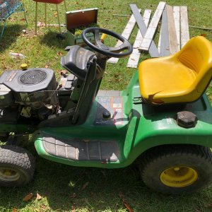 John Deere TL155 that runs great but needs a deck and a hood