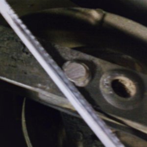 Start hacksawing bolt base