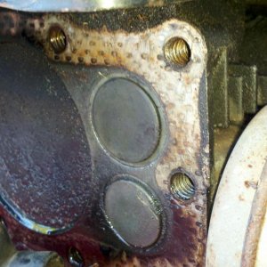 After I re-seated the valve seat, some center-punching and lapping, all is well.