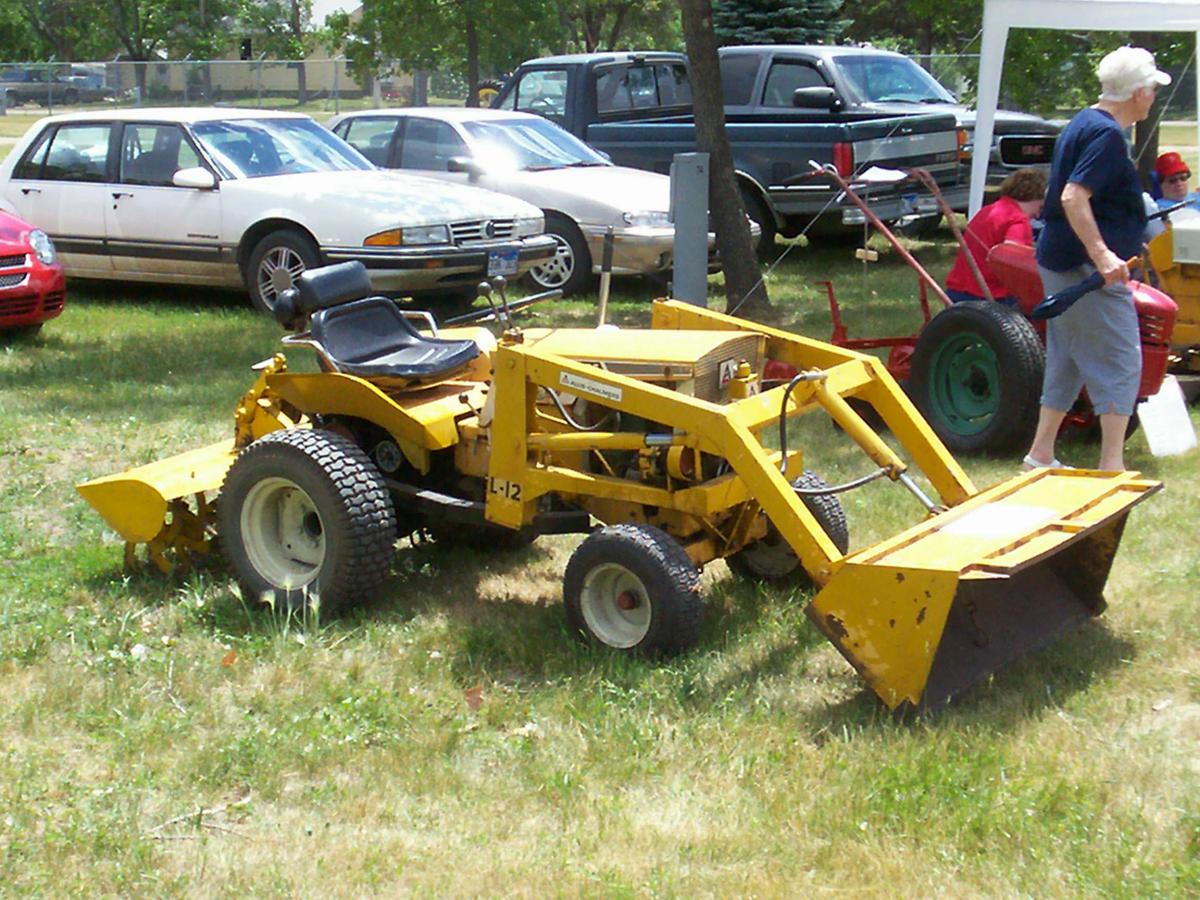 Allis Chalmers B-12
Allis Chalmers Loader and tiller
