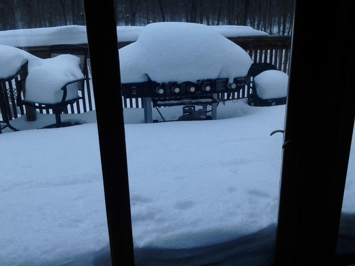 Back deck after the rain melted some of the snow.