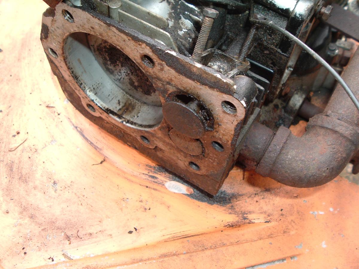 I got the valve loosened up but now there's one major clank happening inside the crankcase. She'll have to come apart.