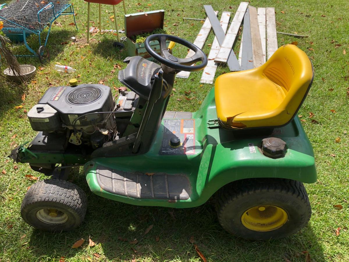 John Deere TL155 that runs great but needs a deck and a hood