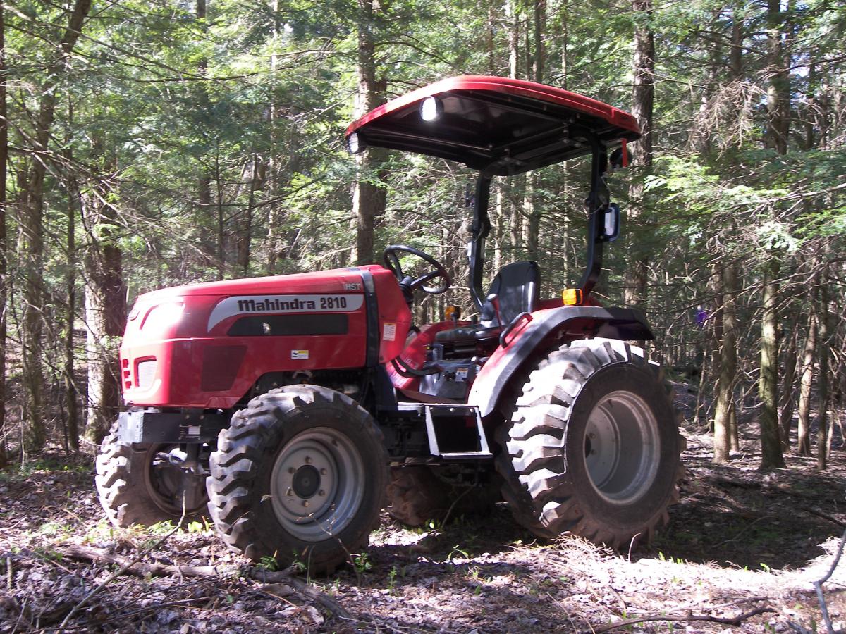 Mahindra 2810HST in the woods working on the "main" road. This road is 1 mile long.