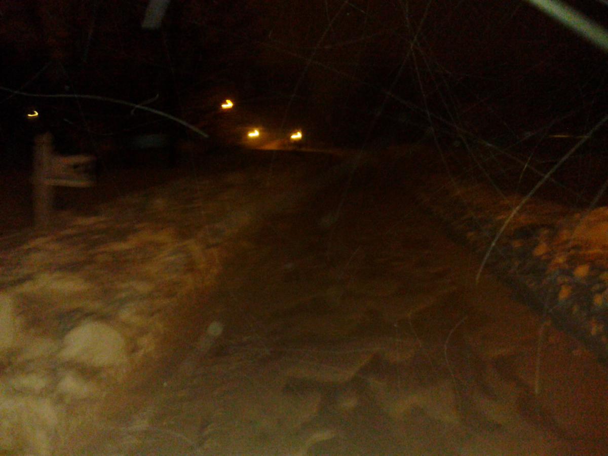 This is around 3 am when they plowed my road with a front end loader. There was around a foot of snow on the road before they plowed and they only mad